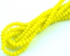 Stiklinis karoliukas rondelė facetuotas žalsvai geltonas(67) 2x1mm juosta